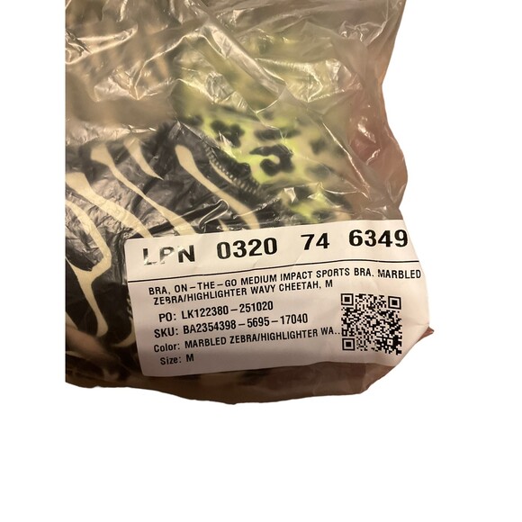 Fabletics NWT On-The-Go Medium Impact Sports Bra in Marbled Zebra Wavy Cheetah - Picture 3 of 5